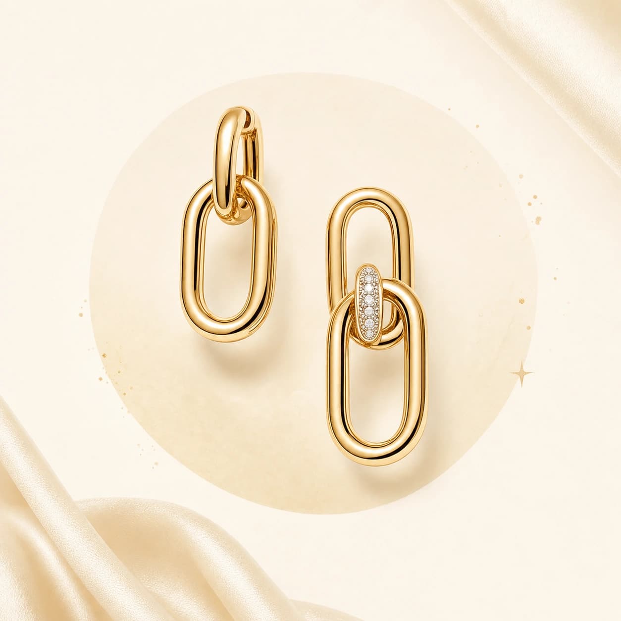Modern yellow-gold chain-link earrings with diamond accents
